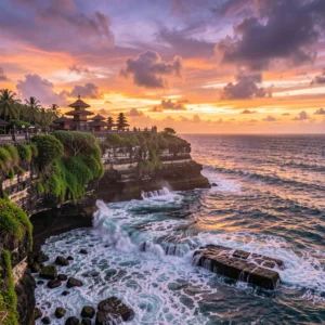 Luxury Bali holiday 2026 — aerial view of Uluwatu cliffs and Indian Ocean at golden hour